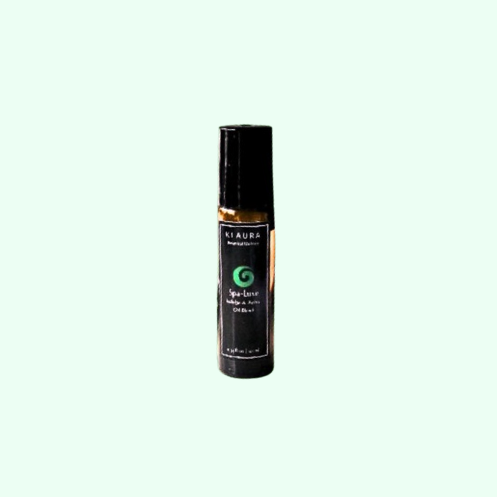Riaura Spa Love essential oil bottle on a white background